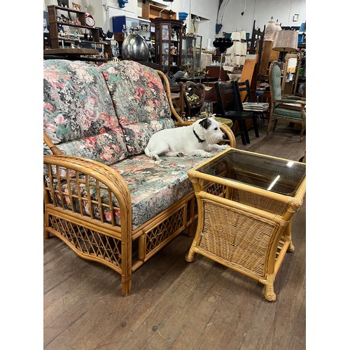 287 - 2 seater Habasco cane/bamboo sofa along with small bamboo coffee table.