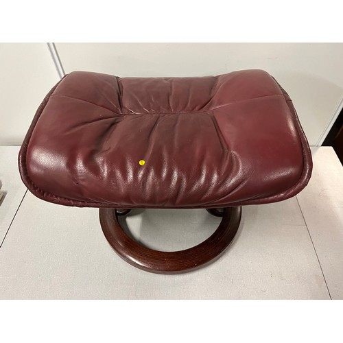 322 - Burgundy leather foot stool on wooden base.