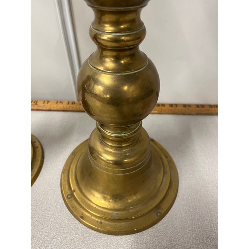 4 - Large pair of heavy brass candle sticks. 
55cm h