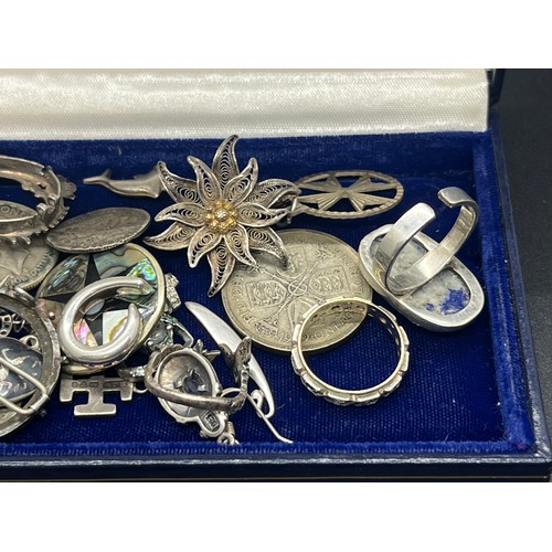 45 - Large lot of mixed silver to include coins, rings & brooches etc. 
134.61