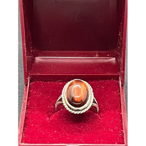 98 - Sterling silver tigers eye ring.