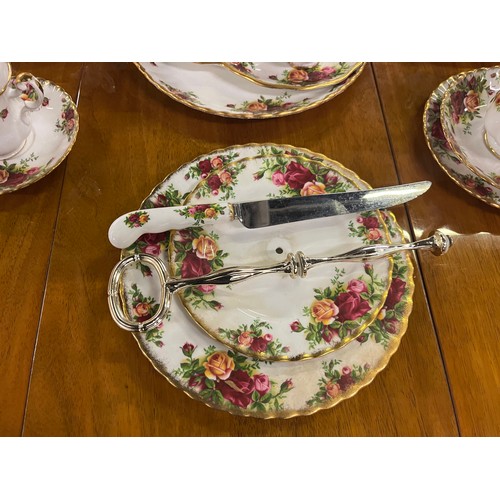 108 - 39 piece Royal Albert Country Rose tea & coffee set to include coffee pot & cake stand.