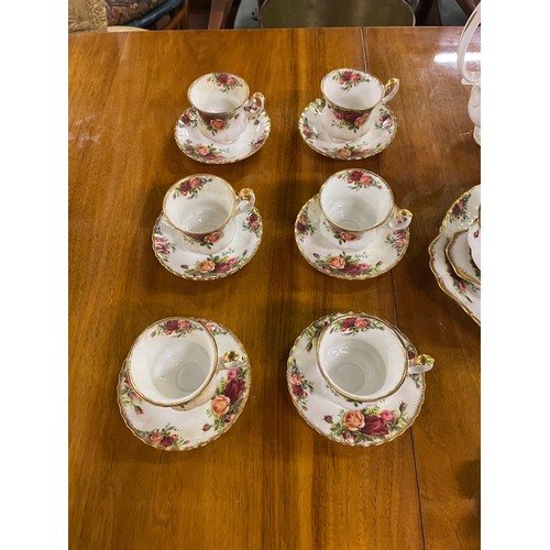 108 - 39 piece Royal Albert Country Rose tea & coffee set to include coffee pot & cake stand.