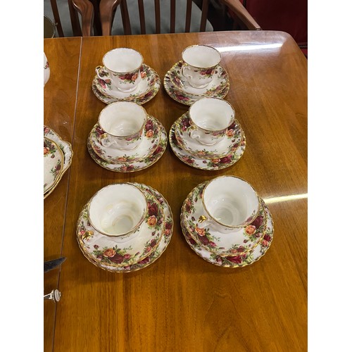 108 - 39 piece Royal Albert Country Rose tea & coffee set to include coffee pot & cake stand.