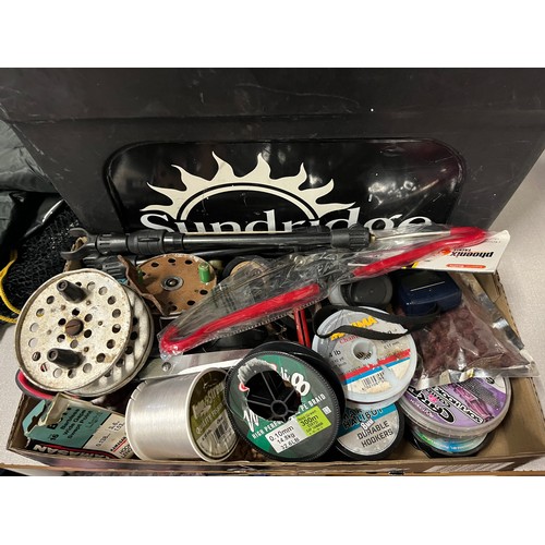 112 - Sunridge fisherman's seat box & contents to include net, new jacket/trouser set & assorted tackle.