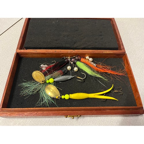 181 - Box of fly tying materials, lures & fishing reels to include Daiwa & shakespeare.