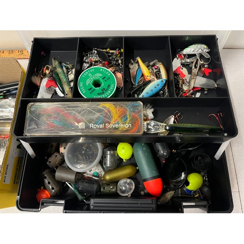 219 - Box of fishing tackle to include large cantilever box of lures & spinners