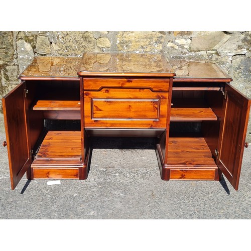 146 - Solid wood desk with pull out shelves & glass top protectors. 1.35 metres