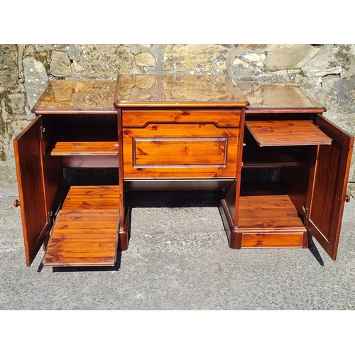 146 - Solid wood desk with pull out shelves & glass top protectors. 1.35 metres