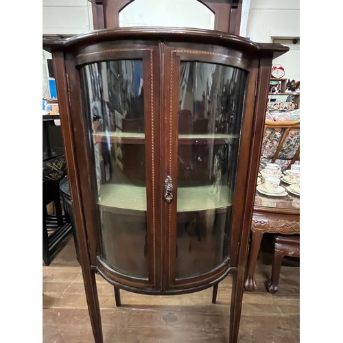 188 - Antique Edwardian inlaid bow fronted display cabinet with mirrored gallery on top. 60 x 22 inches