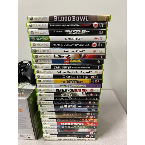 229 - Boxed Xbox 360 with 2 controllers & collection of games (powering up)