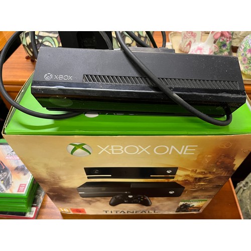 232 - Boxed Xbox One with 5 games & Kinnect (no controllers) powering up.