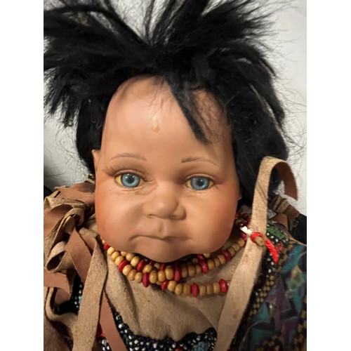 237 - 2 Porcelain Native American Baby dolls.