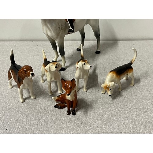 275 - vintage beswick huntswomen on horseback with hounds & fox