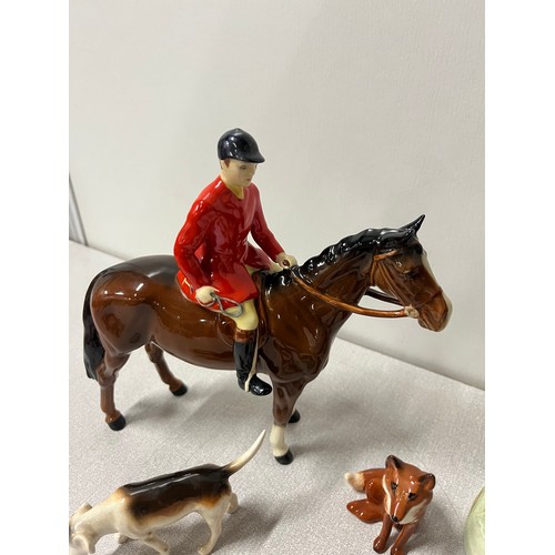 276 - 2 vintage beswick huntsmen on horseback along with hounds & fox.