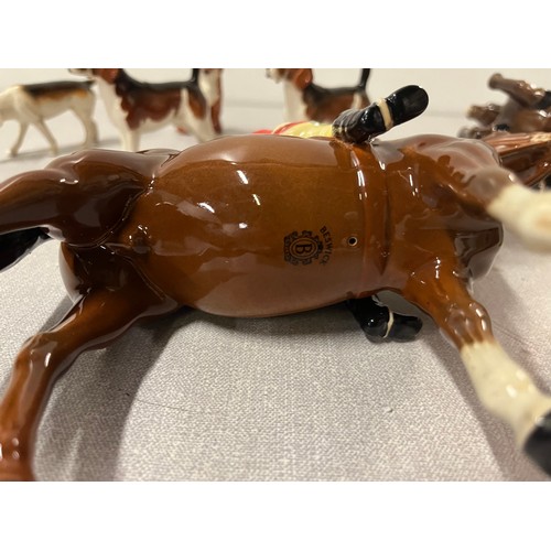 276 - 2 vintage beswick huntsmen on horseback along with hounds & fox.