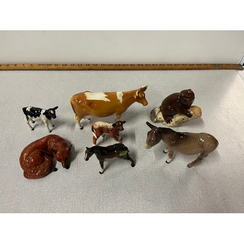 295 - 7 vintage beswick animals to include cow, fox & donkey etc