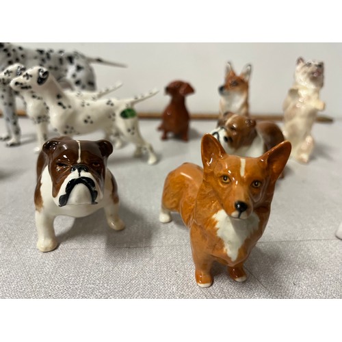 352 - large selection of beswick & doulton animals to include dalmations & pugs etc