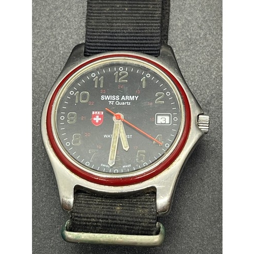 80 - Gents Swiss Army wrist watch along with Swiss army knife & case. 25