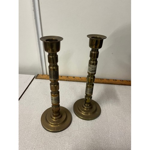 397 - Box of brass to include heavy candlesticks etc.