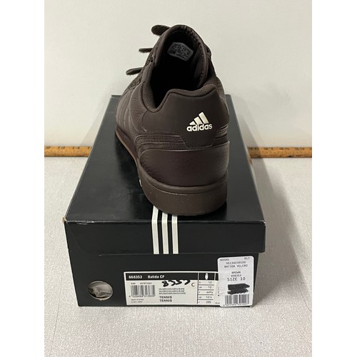 306 - Pair of new Adidas tennis trainers size 10.