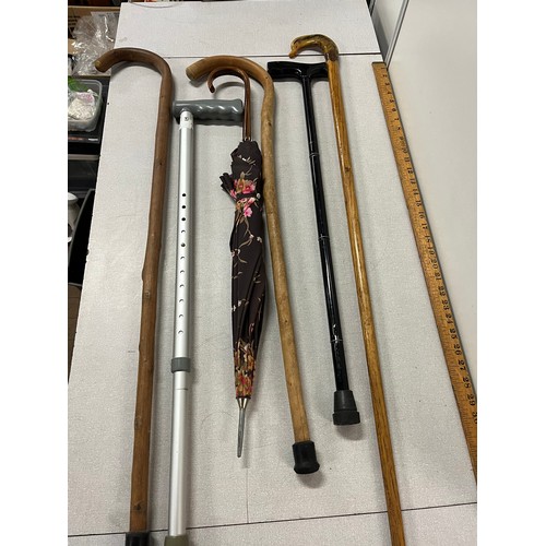 308 - selection of walking sticks & umbrella