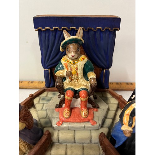 14 - Royal Doulton Bunnykins Henry the VIII & his 6 wives along with stand, all boxed.