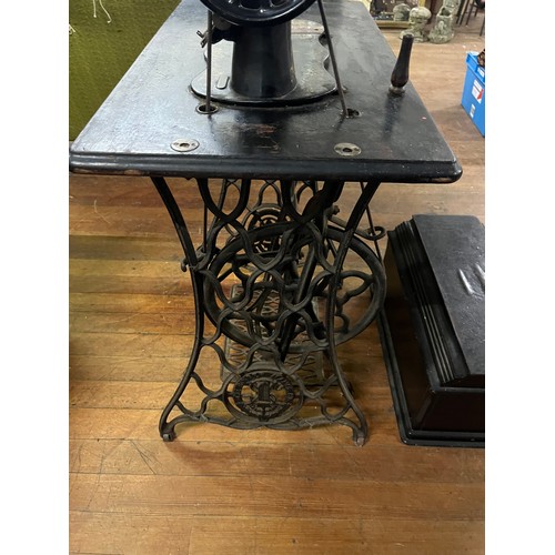 17 - Vintage treadle singer sewing machine.