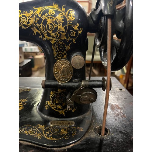 17 - Vintage treadle singer sewing machine.