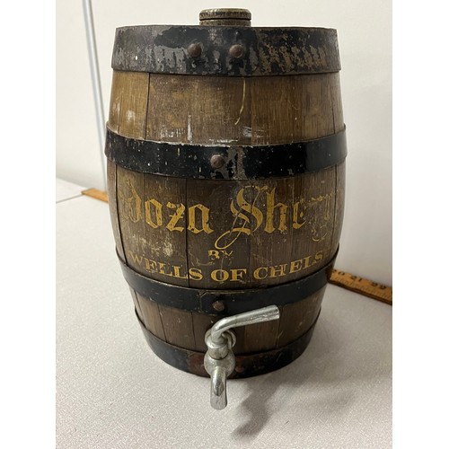 18 - Vintage wooden Cadoza sherry barrel with tap. 
11.5