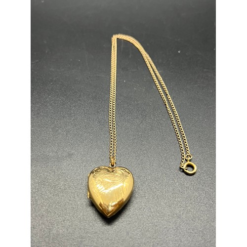 31 - 9ct gold chain with 9ct gold front & back locket.