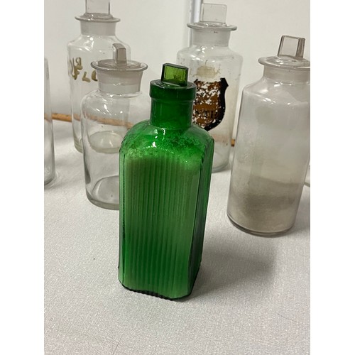 131 - 10 vintage chemists apothocary bottle with lids. 
Tallest 10