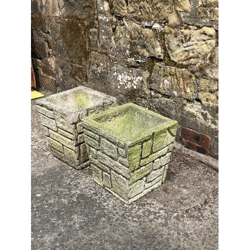 111 - A pair of vintage stone planters
14