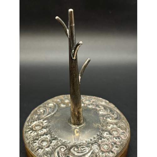 45 - Silver hallmarked ring holder on wooden base.