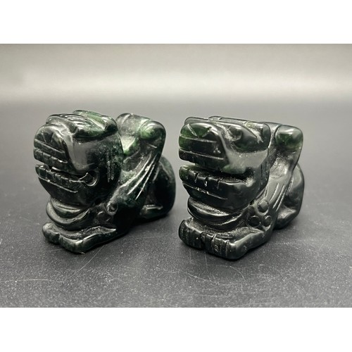 49 - Pair of vintage jade Jaguars/dragons.
1.5