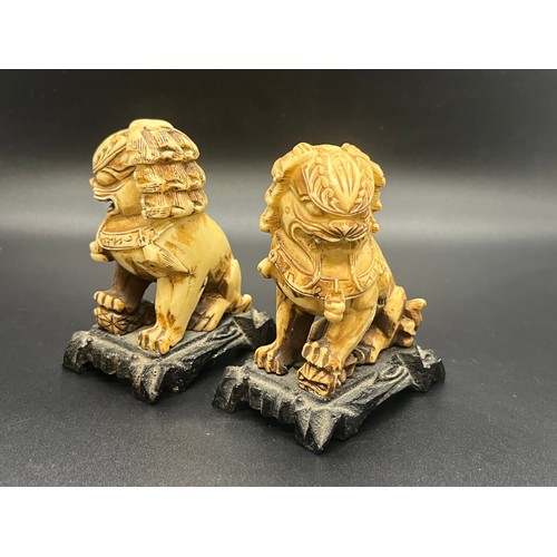 56 - Pair of vintage carved foo dogs.
3