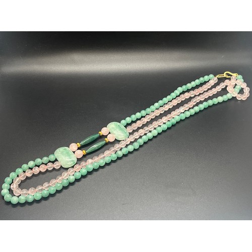 135 - Mint green & pink jade beaded necklace.
158g 31