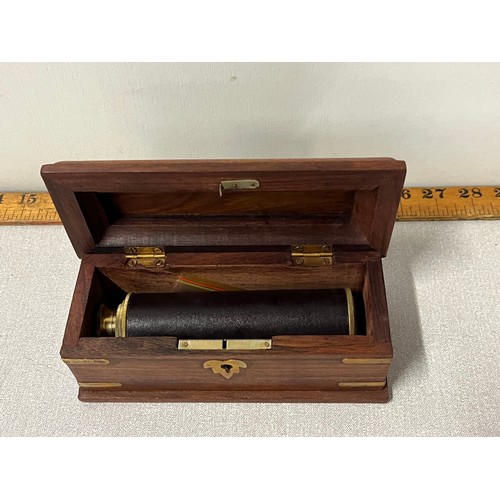 159 - 3 pull telescope in wooden bow with brass inlay.