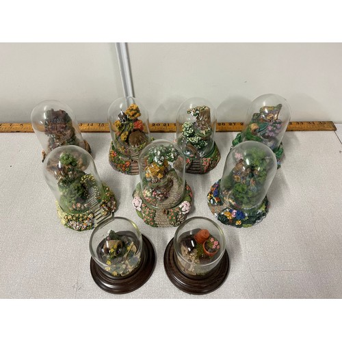 270 - 9 glass domed ornaments to include cottages to include The Franklin Mint