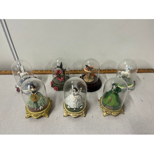 272 - 7  glass domed ornaments to include gone with the wind figurines to include The Franklin Mint