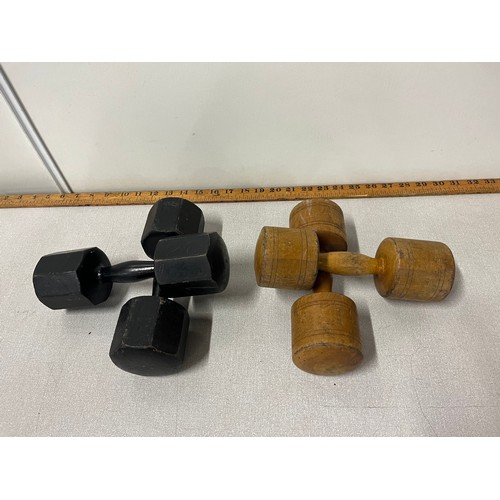 6 - 2 Pairs of antique wooden dumbbells.
Largest 9.5