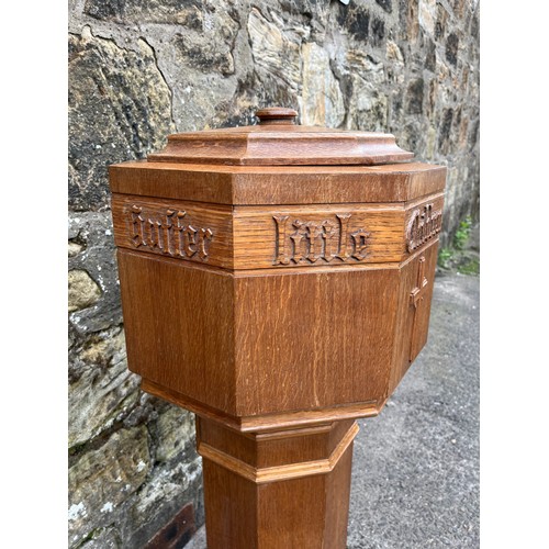 50 - Solid oak baptismal font depicting suffer little children to come unto me.
110cm high