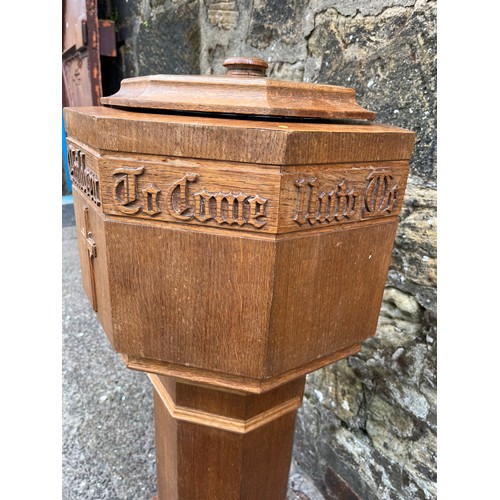 50 - Solid oak baptismal font depicting suffer little children to come unto me.
110cm high