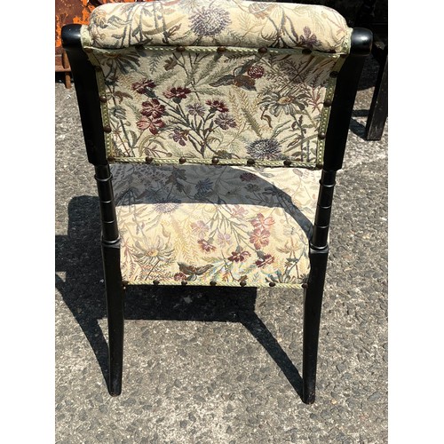 55 - Child's upholstered Victorian nursery chair in ebony on castor feet along with Small solid wood blac... 