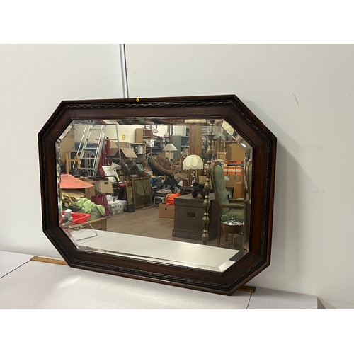 134 - Large antique oak framed bevel edged mirror.
90cm x 65cm
