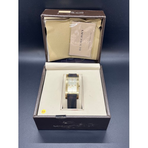 174 - Burberry wristwatch with original box.