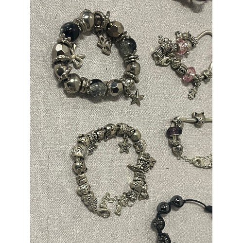 288 - 13 x beaded/charm bracelets.