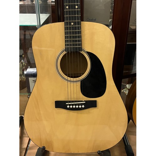 200 - Yamaha CG-101M acoustic guitar along with 1 other.