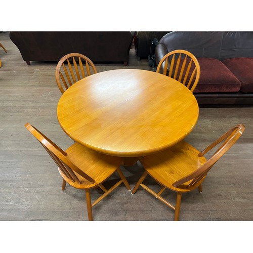 156 - Solid wood round extending table along with 4 Windsor back chairs