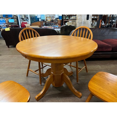 156 - Solid wood round extending table along with 4 Windsor back chairs